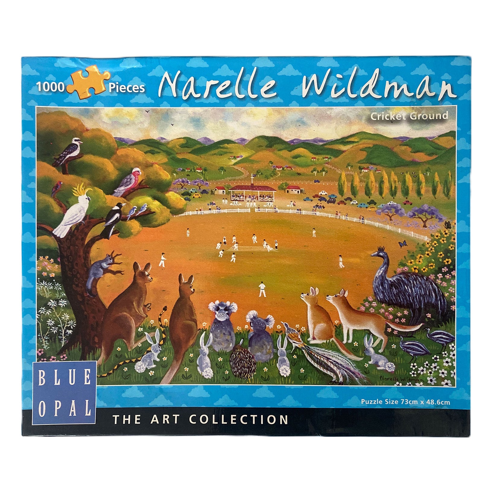 Photo of box of Cricket Ground Blue Opal Puzzle with art by Narelle Wildman.