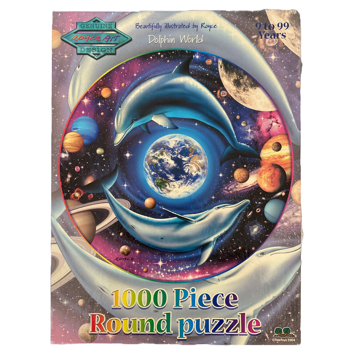 Photo of box of Dolphin World puzzle with art by Royce B McClure.