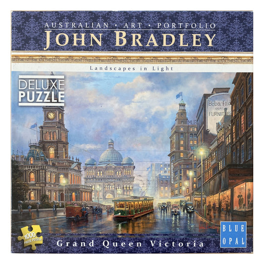 Photo of box of Grand Queen Victoria Blue Opal puzzle with art by John Bradley.